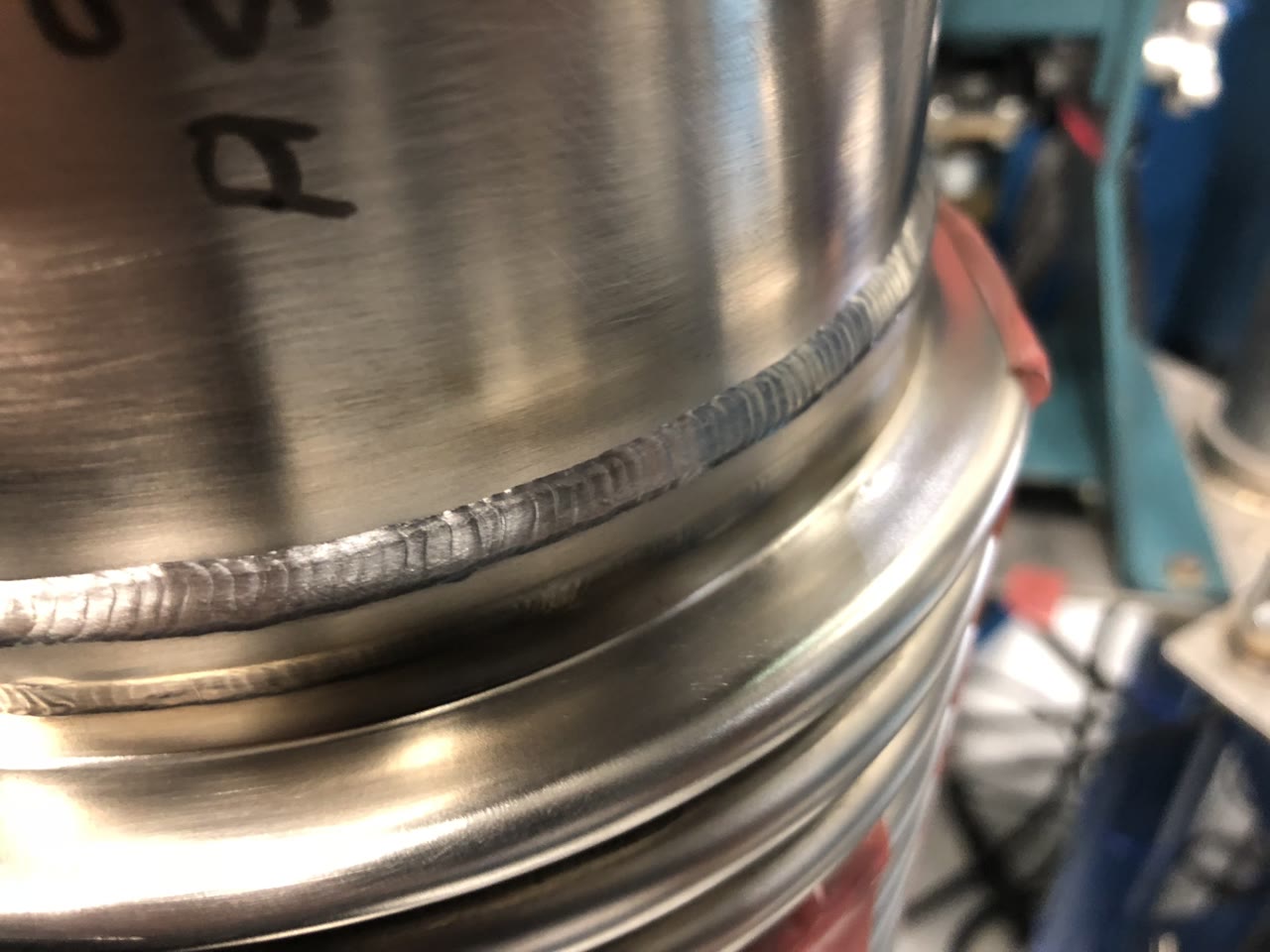 A close-up of a precision DCWI TIG weld on an Inconel component