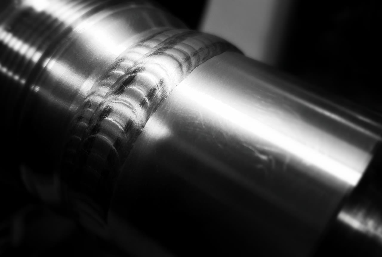 A DCWI TIG weld bead on a polished aluminum cylinder